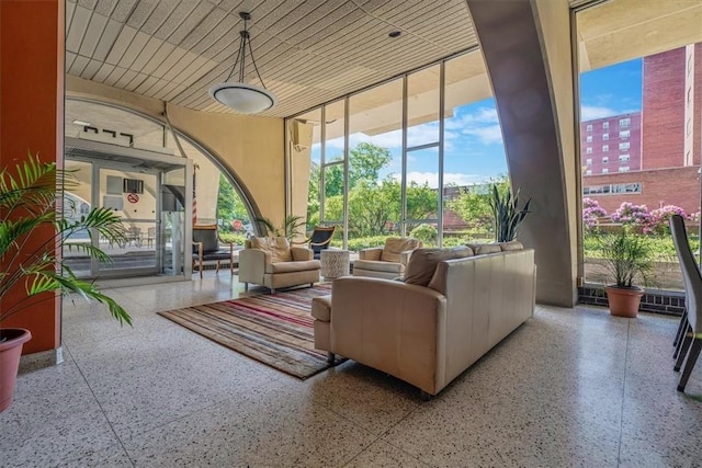 community lobby with a wall of windows