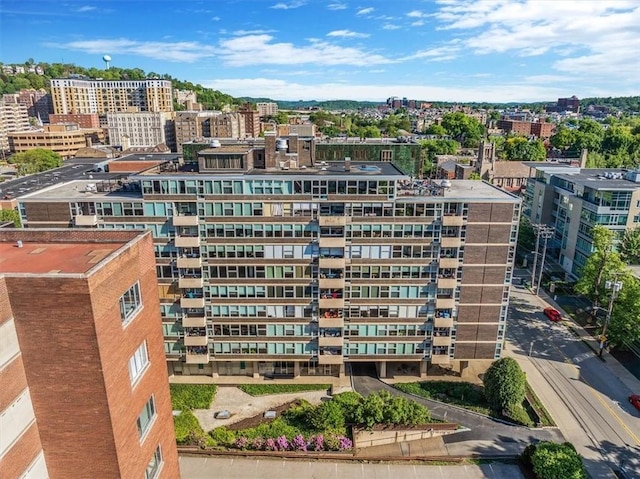 view of property with a city view