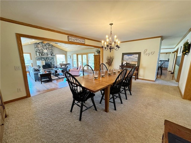 259 Old Mercer Rd, Springfield Twp Mer, PA 16156 - dining area featuring crown molding, a chandelier, a fireplace, light carpet, and baseboards