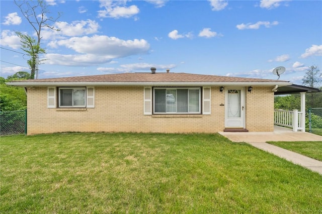 single story home featuring brick siding