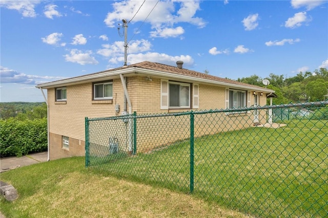 view of property exterior with brick siding