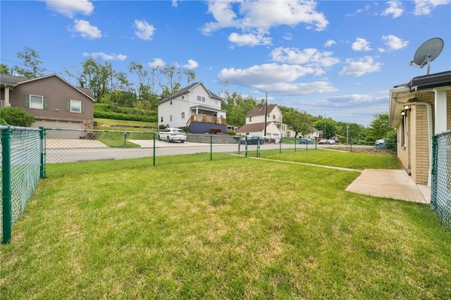 view of yard with a residential view