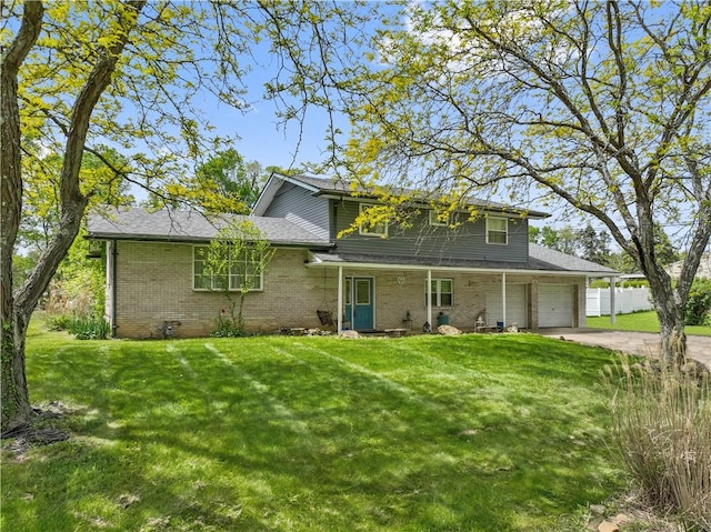 106 Boyanna Dr, Industry, PA 15052 - traditional home featuring driveway, a garage, and brick siding