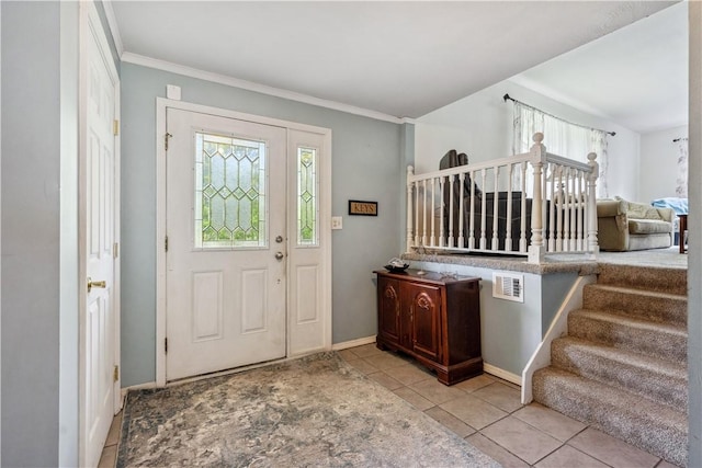 106 Boyanna Dr, Industry, PA 15052 - tiled foyer featuring healthy amount of natural light, crown molding, baseboards, and stairway
