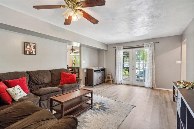 106 Boyanna Dr, Industry, PA 15052 - living area featuring plenty of natural light, a ceiling fan, light wood-style floors, and french doors
