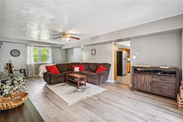 106 Boyanna Dr, Industry, PA 15052 - living area featuring ceiling fan, light wood finished floors, and baseboards