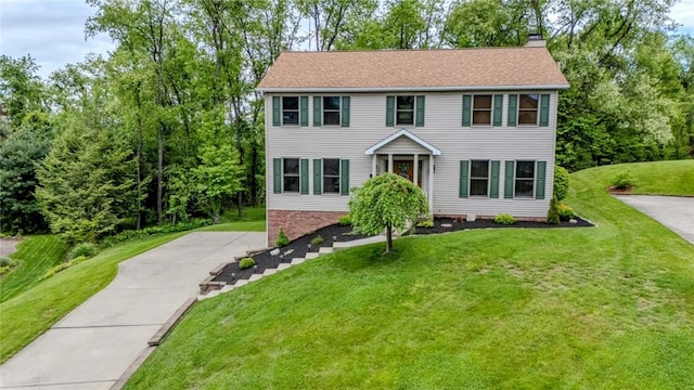 1016 Timberwood Ct, Murrysville, PA 15668 - colonial-style house with a chimney and a front lawn
