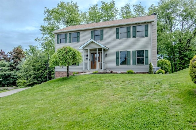 1016 Timberwood Ct, Murrysville, PA 15668 - colonial-style house featuring a chimney and a front yard