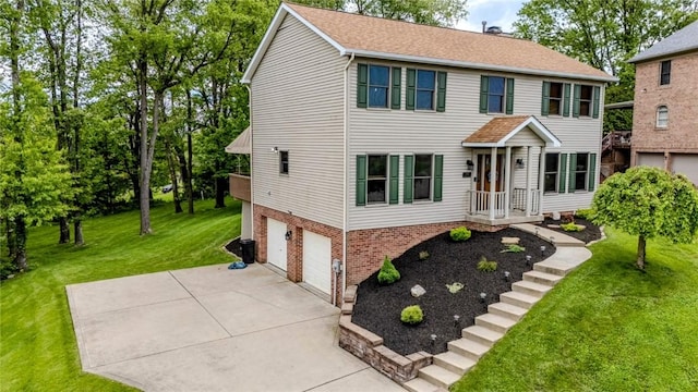 1016 Timberwood Ct, Murrysville, PA 15668 - colonial house with driveway, a garage, brick siding, and a front yard