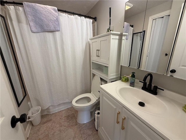 bathroom featuring toilet, vanity, and shower / bath combination with curtain