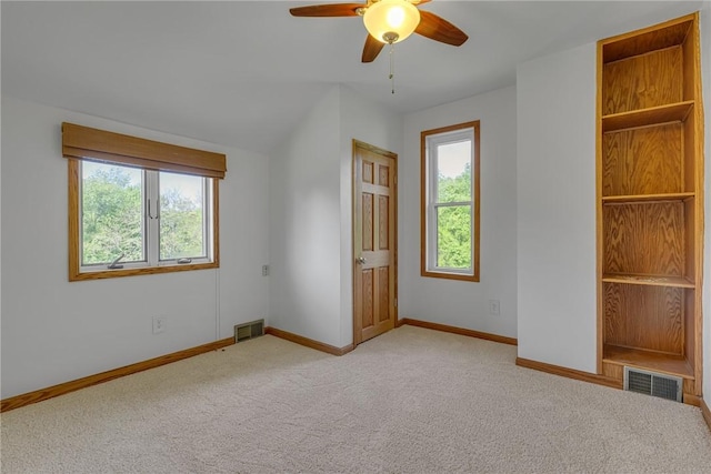 584 Park Rd, Chippewa Twp, PA 15010 - unfurnished bedroom featuring light carpet, baseboards, and ceiling fan