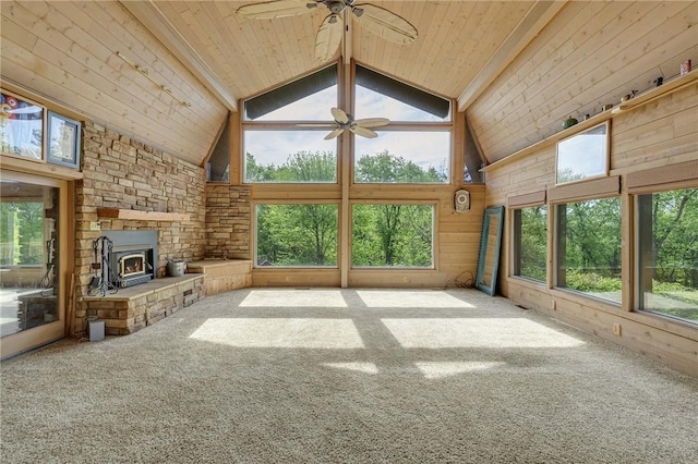 584 Park Rd, Chippewa Twp, PA 15010 - unfurnished living room featuring a ceiling fan, wooden ceiling with exposed beams, plenty of natural light, wooden walls, and high vaulted ceiling