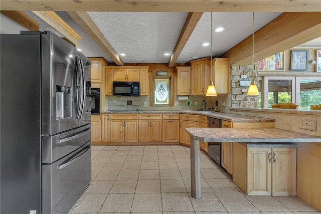 584 Park Rd, Chippewa Twp, PA 15010 - kitchen featuring black appliances, a textured ceiling, healthy amount of natural light, a peninsula, and backsplash