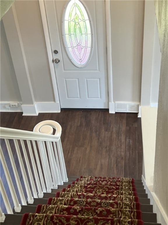 entryway featuring dark wood-style floors