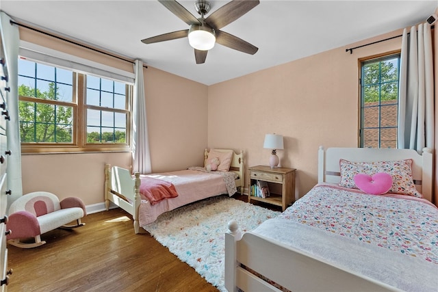 4030 Dalewood St, Brentwood, PA 15227 - bedroom with wood finished floors, baseboards, and ceiling fan