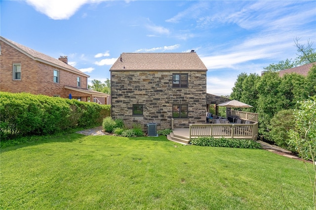 4030 Dalewood St, Brentwood, PA 15227 - rear view of house with cooling unit, stone siding, and a yard