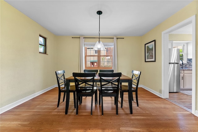 4030 Dalewood St, Brentwood, PA 15227 - dining room featuring baseboards and wood finished floors