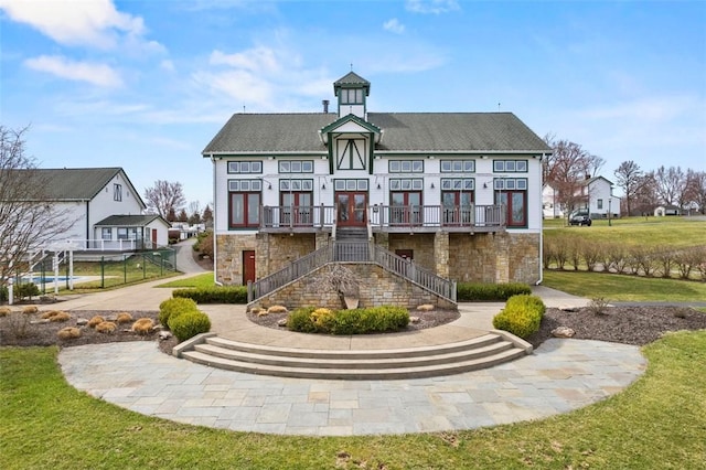 view of property featuring stairs