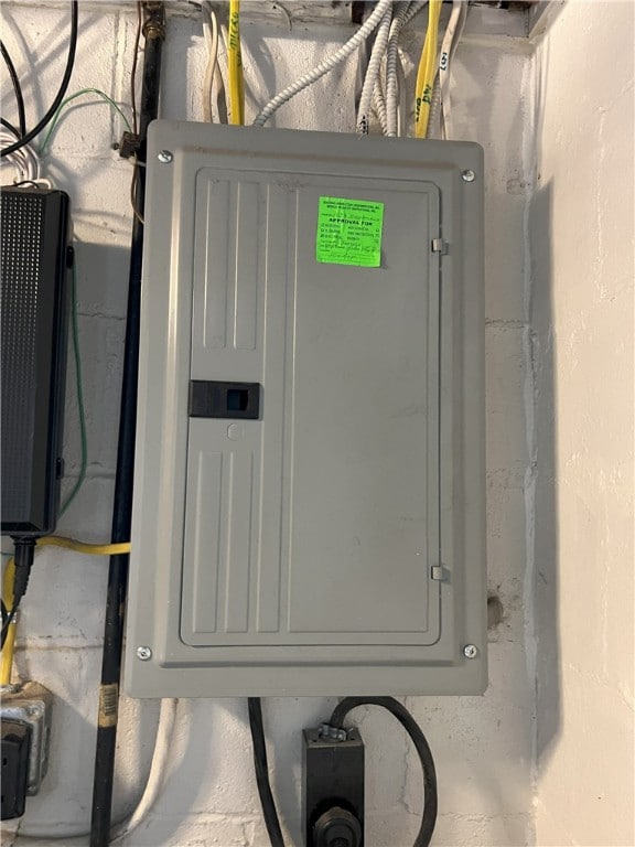 utility room featuring electric panel