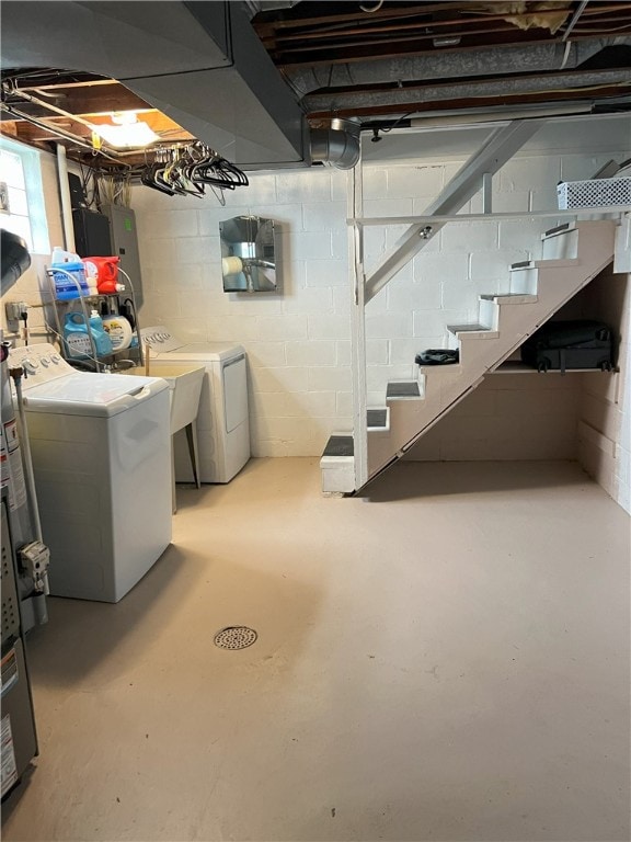 below grade area with separate washer and dryer and electric panel