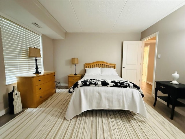 bedroom with baseboards