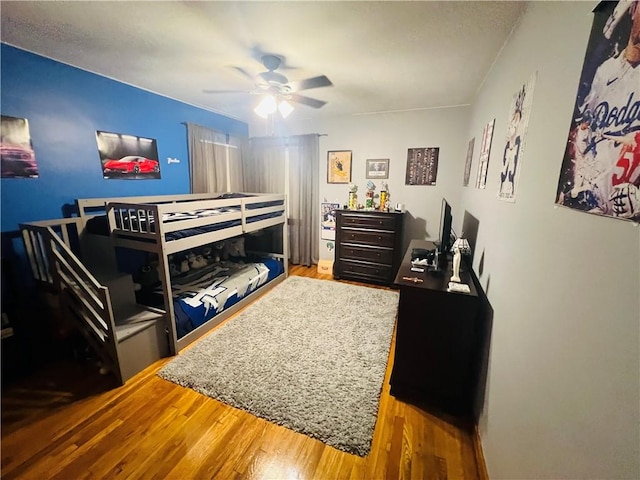 3750 Margate Rd, Churchill Boro, PA 15221 - bedroom with wood finished floors and ceiling fan