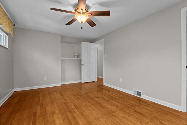 202 Pickwick Dr, Bethel Park, PA 15102 - spare room with a ceiling fan, baseboards, and wood finished floors