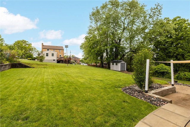 202 Pickwick Dr, Bethel Park, PA 15102 - view of grassy yard featuring a storage unit and an outbuilding
