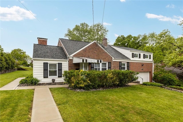 202 Pickwick Dr, Bethel Park, PA 15102 - view of front of house featuring a chimney, brick siding, and a front yard