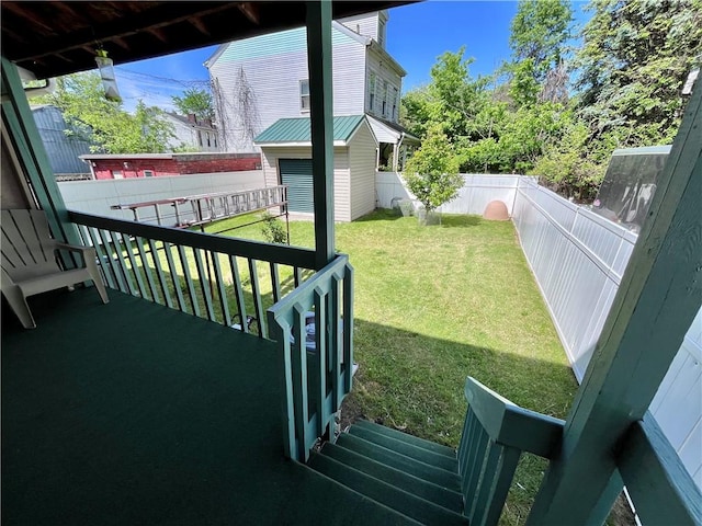 view of yard with a storage unit, an outdoor structure, and a wooden deck