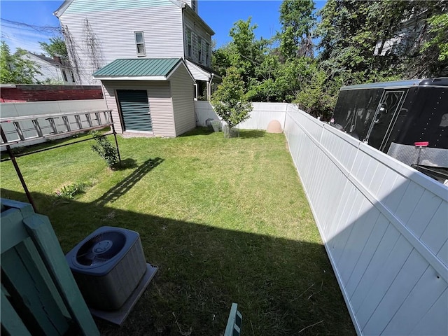 view of yard featuring central AC