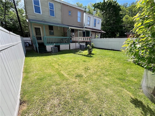 back of property with central air condition unit