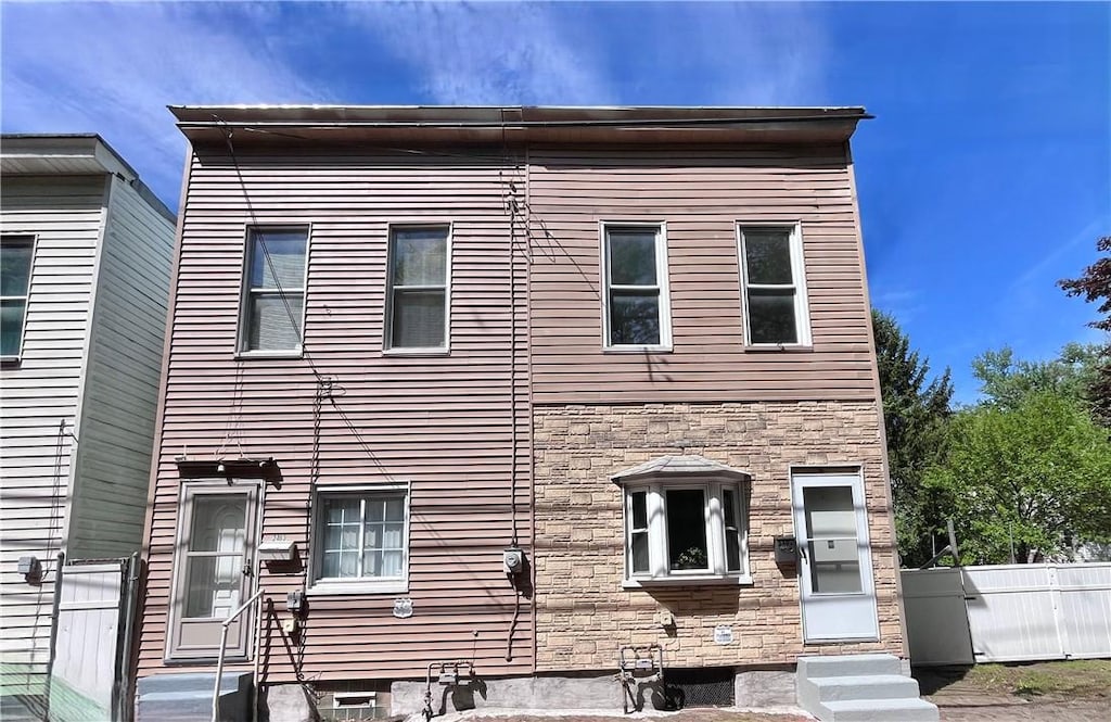 2403-2405 Sorrell St, Marshall Shadeland, PA 15212 - view of front of home featuring entry steps, stone siding, and fence