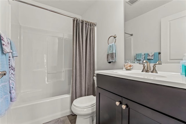full bathroom featuring toilet, shower / bath combination with curtain, and vanity