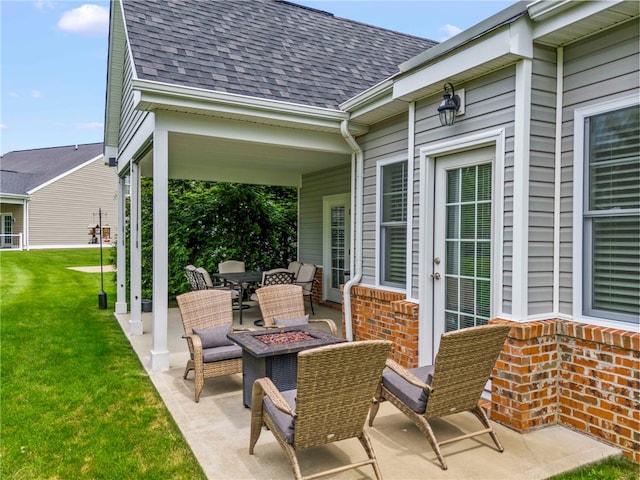 view of patio / terrace with a fire pit