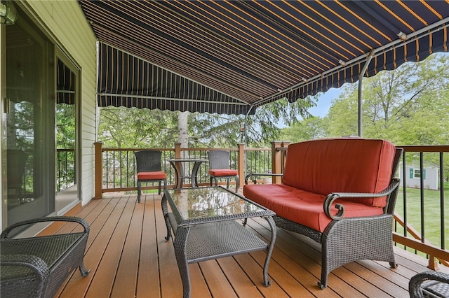 wooden deck with outdoor lounge area