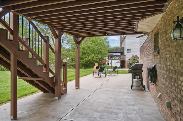 view of patio / terrace featuring stairway