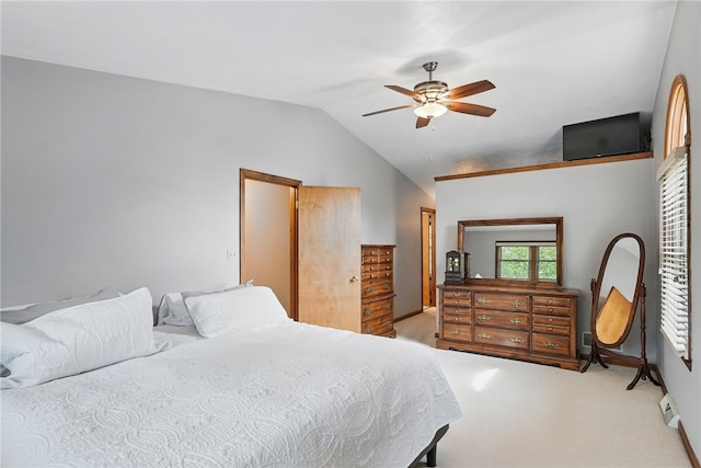 bedroom featuring vaulted ceiling, carpet, ceiling fan, and baseboards