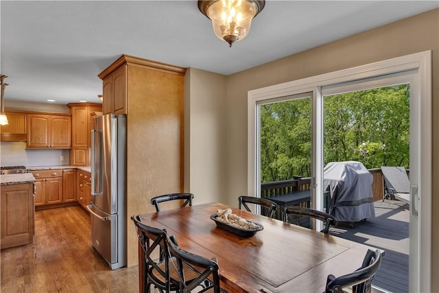 dining room featuring light wood finished floors