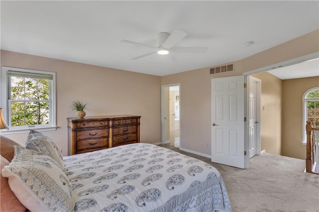 bedroom with carpet, baseboards, and a ceiling fan
