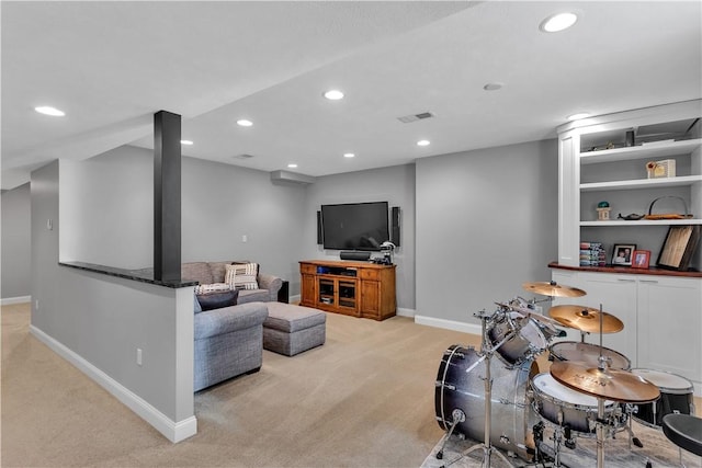 living room featuring light colored carpet, recessed lighting, and baseboards