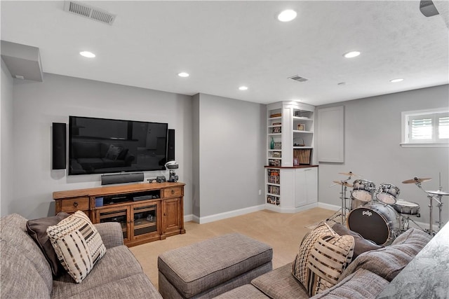living area featuring light colored carpet, recessed lighting, and baseboards