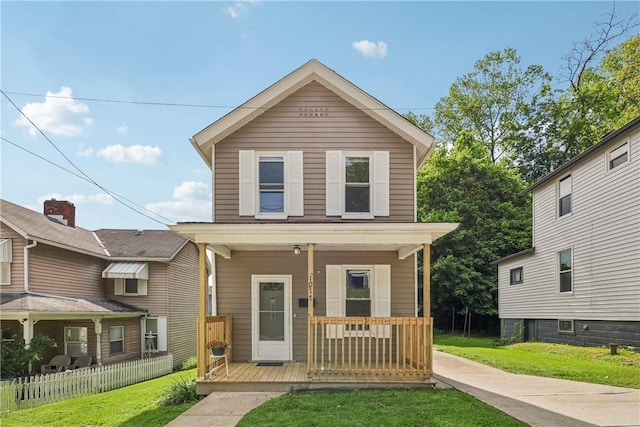 1017 Main St, Coraopolis, PA 15108 - view of front of home with a porch and a front lawn
