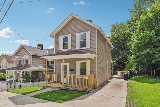 1017 Main St, Coraopolis, PA 15108 - view of front facade with covered porch and concrete driveway