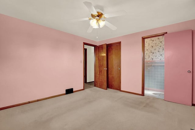 1409 Gill Hall Rd, Jefferson Hills, PA 15025 - unfurnished bedroom with carpet, baseboards, ensuite bath, ceiling fan, and a closet