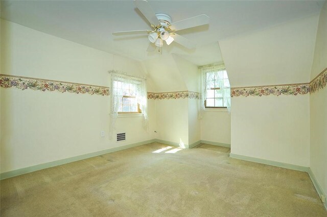 338 Elizabeth Ave, Chalfant Boro, PA 15112 - spare room featuring carpet floors, ceiling fan, baseboards, and vaulted ceiling