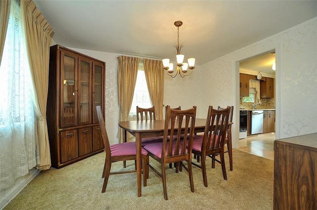 338 Elizabeth Ave, Chalfant Boro, PA 15112 - dining area with a chandelier and light carpet