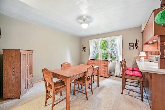 1807 Memorial, Farrell, PA 16121 - dining space featuring light colored carpet and a baseboard heating unit