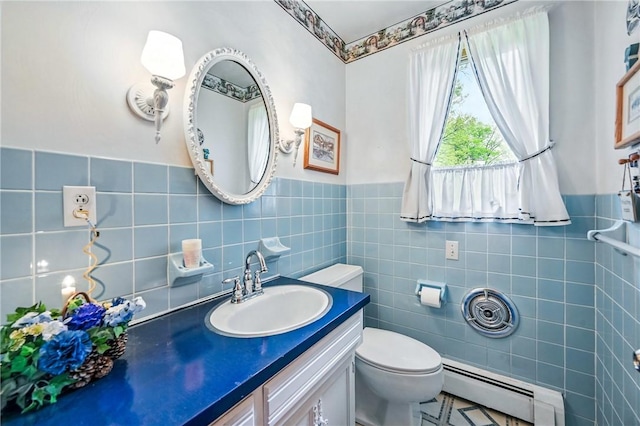 1807 Memorial, Farrell, PA 16121 - bathroom with a baseboard heating unit, tile walls, a wainscoted wall, toilet, and vanity