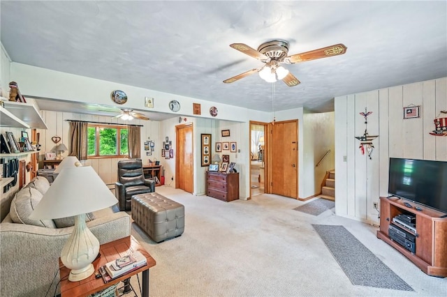 1807 Memorial, Farrell, PA 16121 - living area featuring ceiling fan, light colored carpet, and stairway